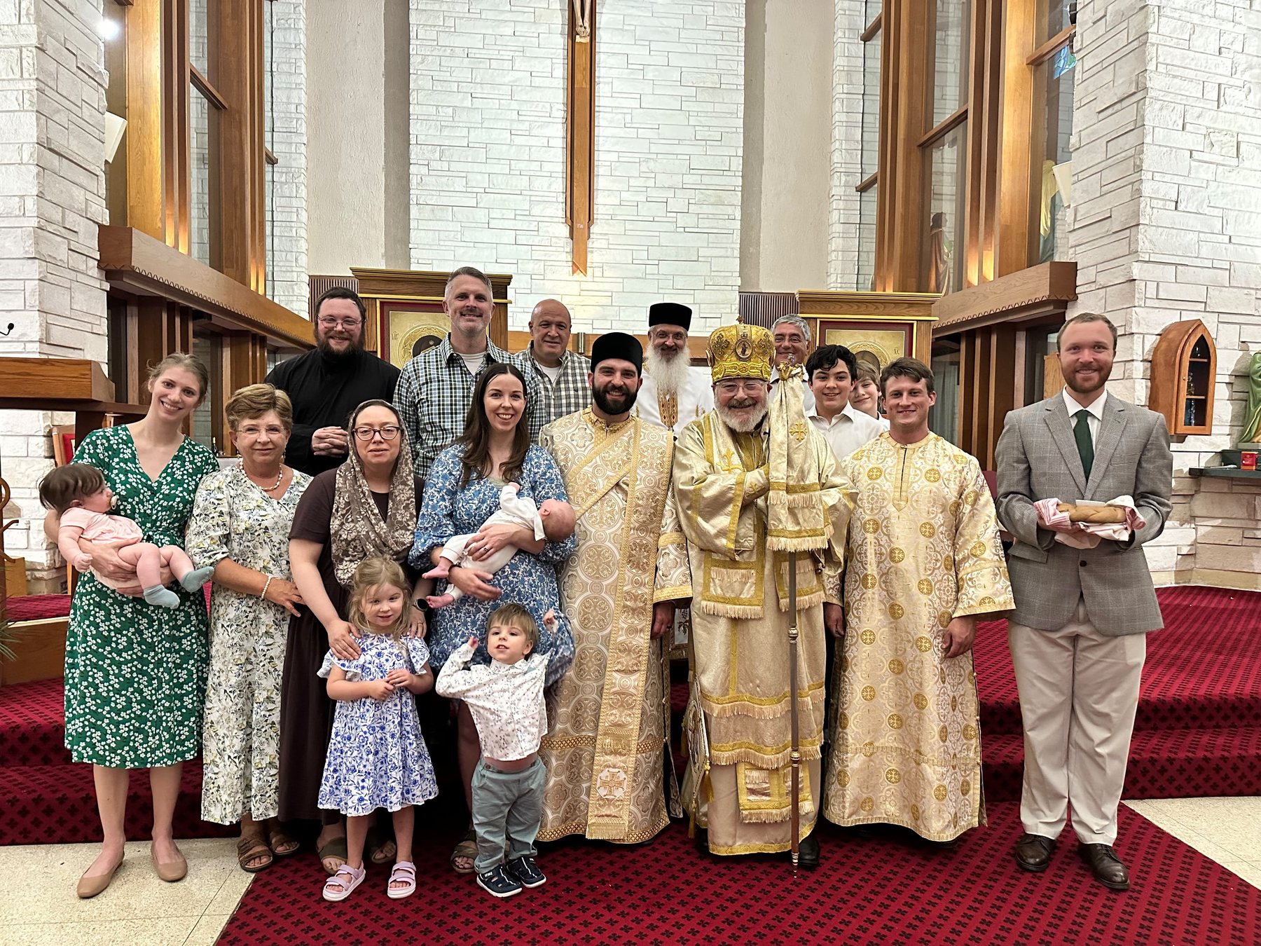 Three generations, with the bishop and the new deacon