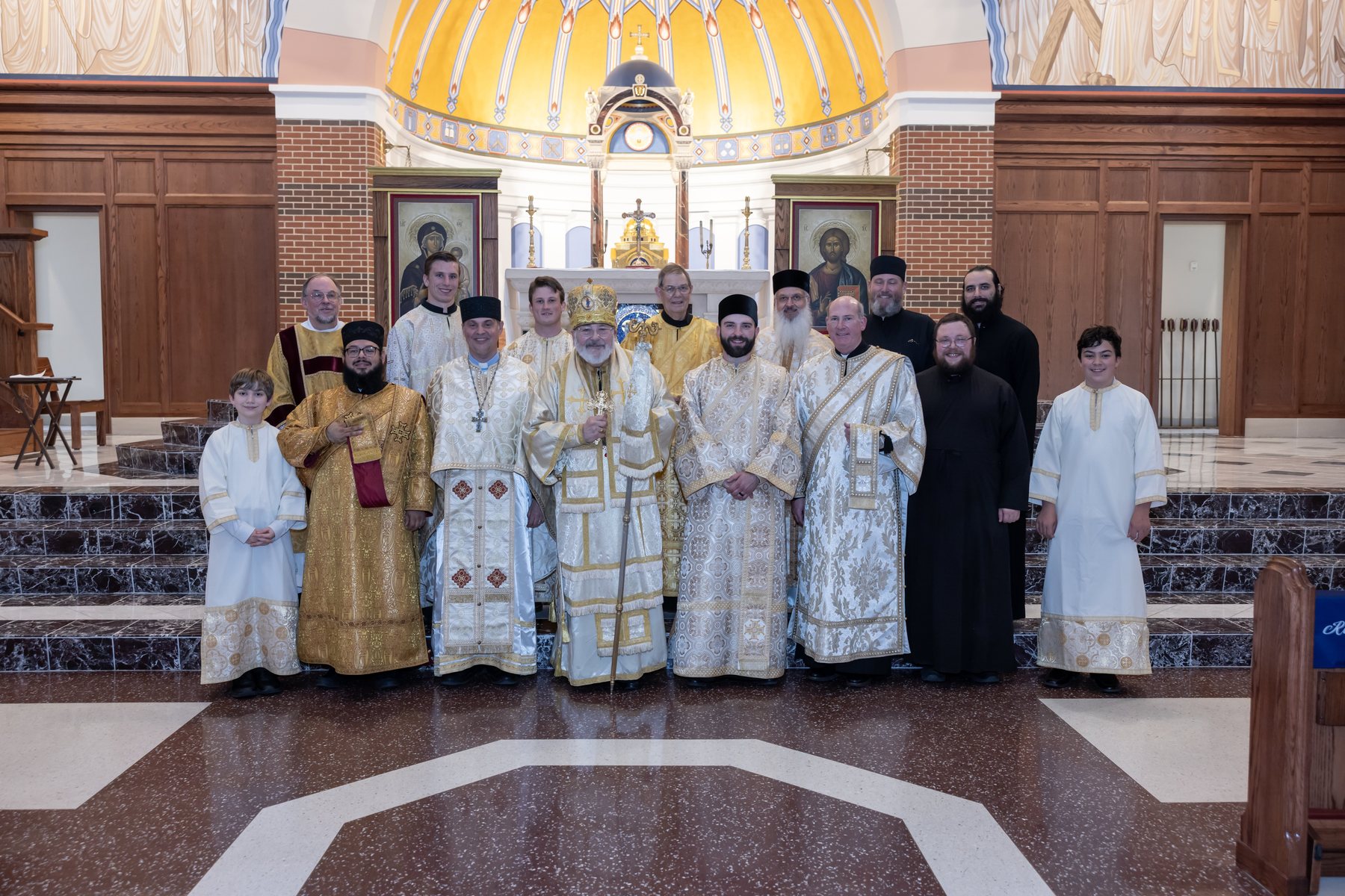 Bishop John Michael Botean with the clergy and servers at St. Mary’s