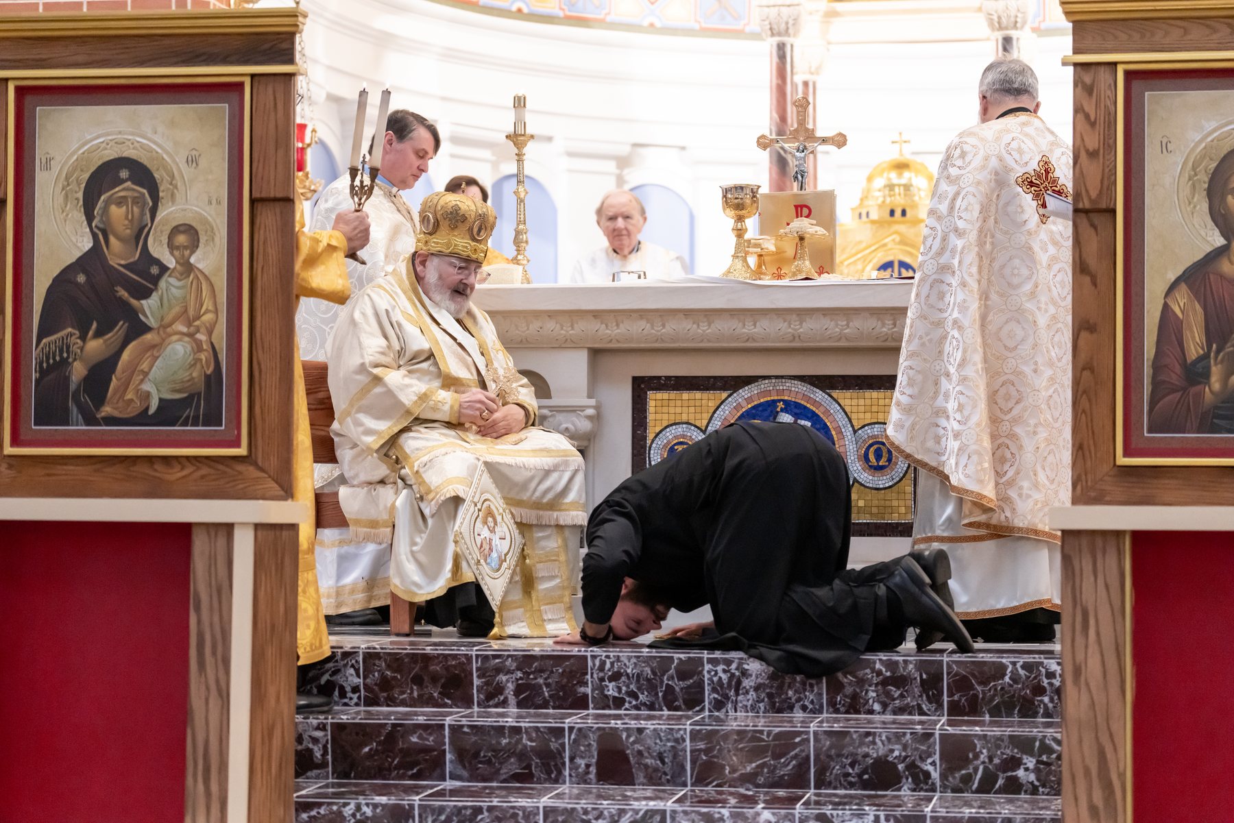 The ordinand prostrates before the bishop